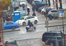 Crazy Bicycle Crossing Amsterdam